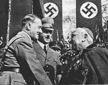 Pope Pius XII meeting Adolf Hitler. His public silence regarding the Final Solution has led history to rename him Pope Gutless Bastard I.